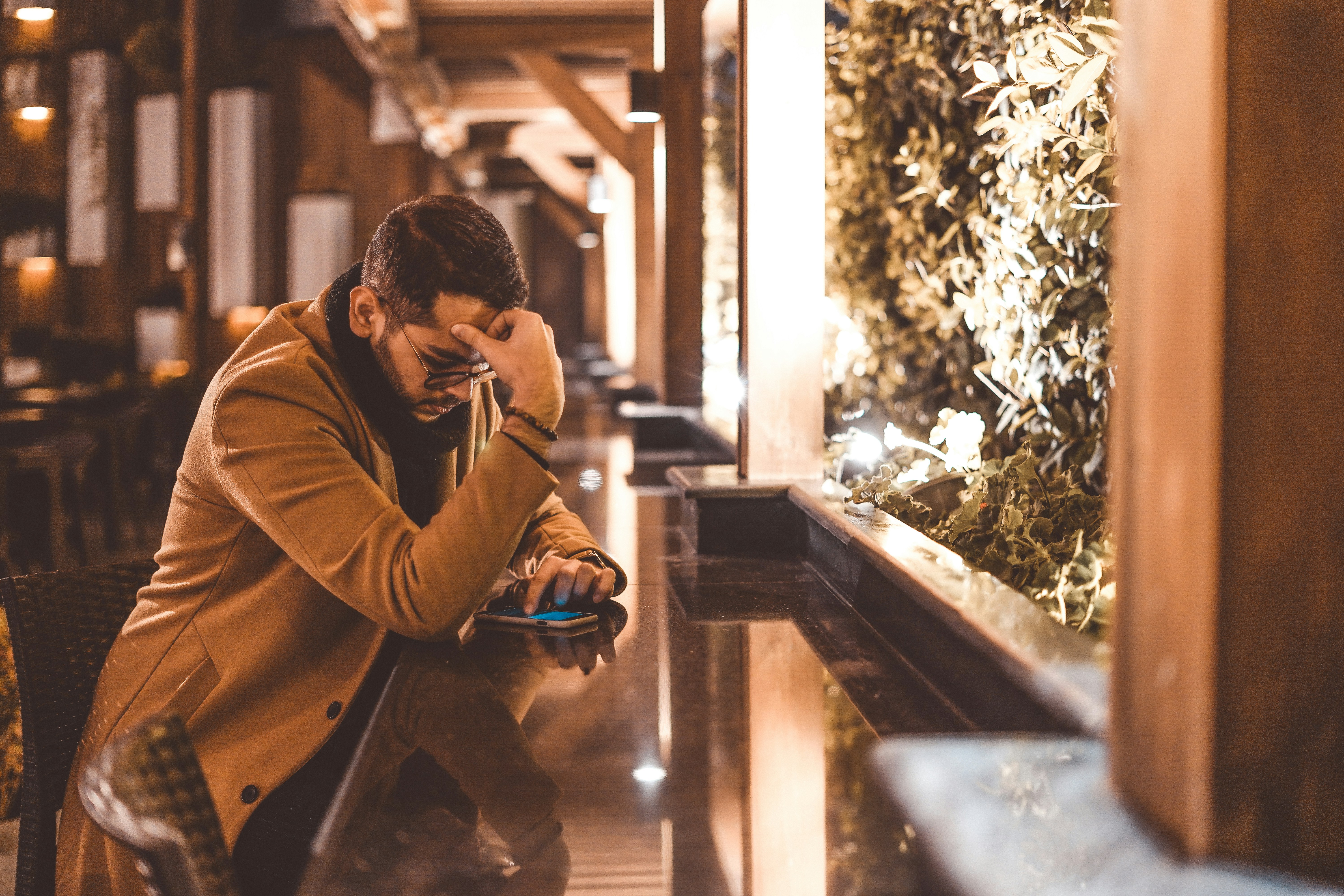 Alone at the bar, scrolling through another dating app